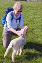 Woman Stroking a Lamb Royalty Free Stock Photo