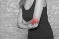 Woman struggles with elbow pain, injury