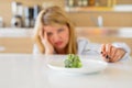 Woman struggling with her diet Royalty Free Stock Photo