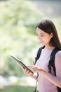 Woman student with digital tablet Royalty Free Stock Photo