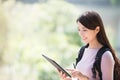 Woman student with digital tablet Royalty Free Stock Photo