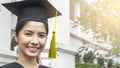 Woman student smiles and feel happy in graduation gowns and cap Royalty Free Stock Photo