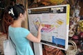 Woman Studies a Map at Chatuchak Market in Bangkok Royalty Free Stock Photo