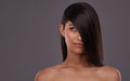 Woman, studio and haircare with thinking beauty, Indian female person with luxury and salon treatment. Brazilian and