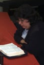 A woman studying the Bible