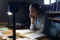 Woman studying late at night