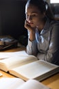 Woman studying late at night