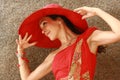 Woman with stunning big red hat Royalty Free Stock Photo