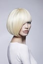 Woman with stylish bob haircut. beautiful blond girl