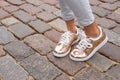 Woman with stylish shoes in the city