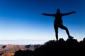 Woman success concept silhouette on mountain top