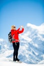 Woman success selfie on mountain peak Royalty Free Stock Photo