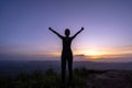 Woman successful hiking climbing silhouette in mountains