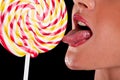 Woman sucking cute sweet candy Royalty Free Stock Photo