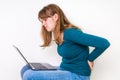 Woman is suffering from back pain - bad posture concept Royalty Free Stock Photo