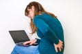 Woman is suffering from back pain - bad posture concept Royalty Free Stock Photo