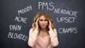 Woman suffering headache due to imaginary problems in pms, hormone imbalance Royalty Free Stock Photo