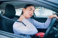 Woman suffering injury after car crash fender bender Royalty Free Stock Photo