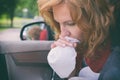 Woman suffering from motion sickness Royalty Free Stock Photo