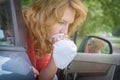 Woman suffering from motion sickness Royalty Free Stock Photo