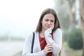 Woman suffering tooth ache a foggy day