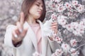 A woman suffers from allergies during the flowering period. Royalty Free Stock Photo