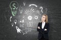 Woman in suit, business idea sketch on chalkboard Royalty Free Stock Photo