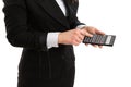 Woman in suit holding a calculator and pressing a button Royalty Free Stock Photo
