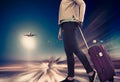 Woman with suitcase awaiting aircraft Royalty Free Stock Photo