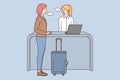 Woman with suitcase talk with administrator on reception Royalty Free Stock Photo