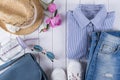 woman summer clothes and accessories collage on white with shirt, jeans, glasses, shoes, handbag, hat, Jar Royalty Free Stock Photo