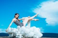 Woman in summer dress with party balloons. Fashion portrait of woman. inspiration and imagination. girl sit in sky