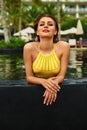 Woman Summer Fashion. Girl Relaxing In Swimming Pool. Beauty Royalty Free Stock Photo