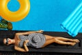 Woman Summer Fashion. Girl Sunbathing By Swimming Pool. Beauty Royalty Free Stock Photo