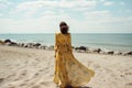 woman summer hippie sea sunlight lifestyle fashion dress person beautiful beach. Generative AI. Royalty Free Stock Photo
