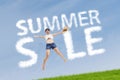 Woman with summer sale sign