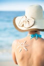 Woman with sun drawn from sunscreen on back Royalty Free Stock Photo