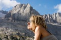 The woman in the sun in front of the beautiful mountains Royalty Free Stock Photo