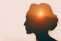 Woman with sun over clouds in her head. Royalty Free Stock Photo