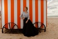 Woman sun sand hut, De Panne, Belgium Royalty Free Stock Photo