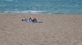 A woman sunbathe in El Arenal beach in Mallorca wide
