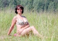 Woman sunbathing on grass Royalty Free Stock Photo
