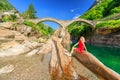 woman sunbathing at Ponte dei Salti Bridge Royalty Free Stock Photo