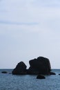 Woman sunbathing on rock koh samui island thailand Royalty Free Stock Photo