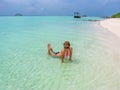 Woman sunbathing in tropical vacation