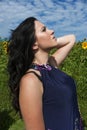 Woman in sunflower field Royalty Free Stock Photo