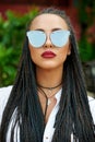 Woman in sunglasses - close up portrait