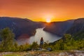 Woman by sunset at the Aurlandsfjord