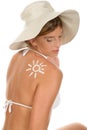 Woman with suntan lotion Royalty Free Stock Photo