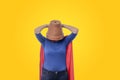 Woman superhero with a red cape and a flower pot on her head Royalty Free Stock Photo